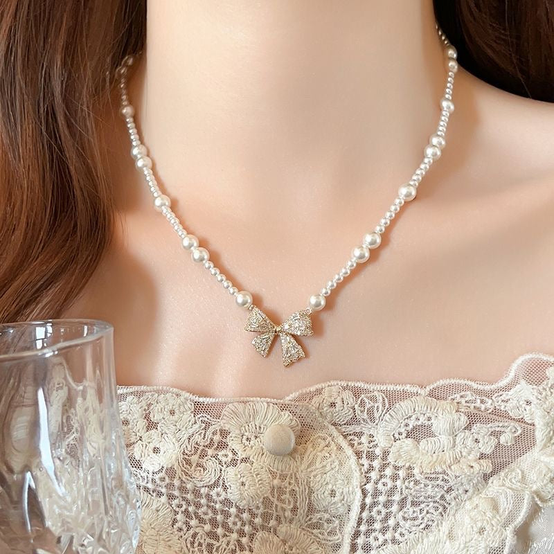 White Bow Pearl Necklace