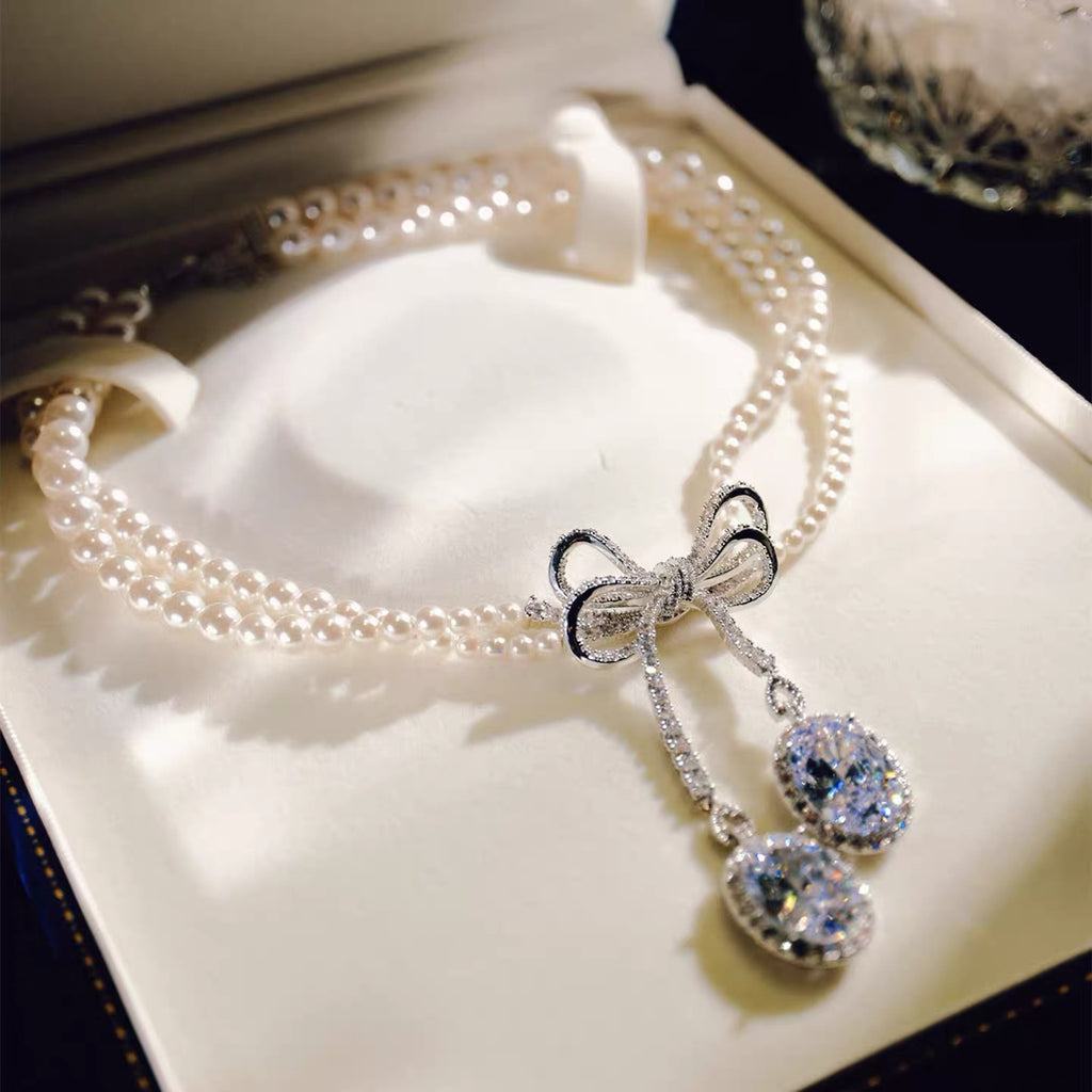 Pearl and White Zircon Bow Jewel Set