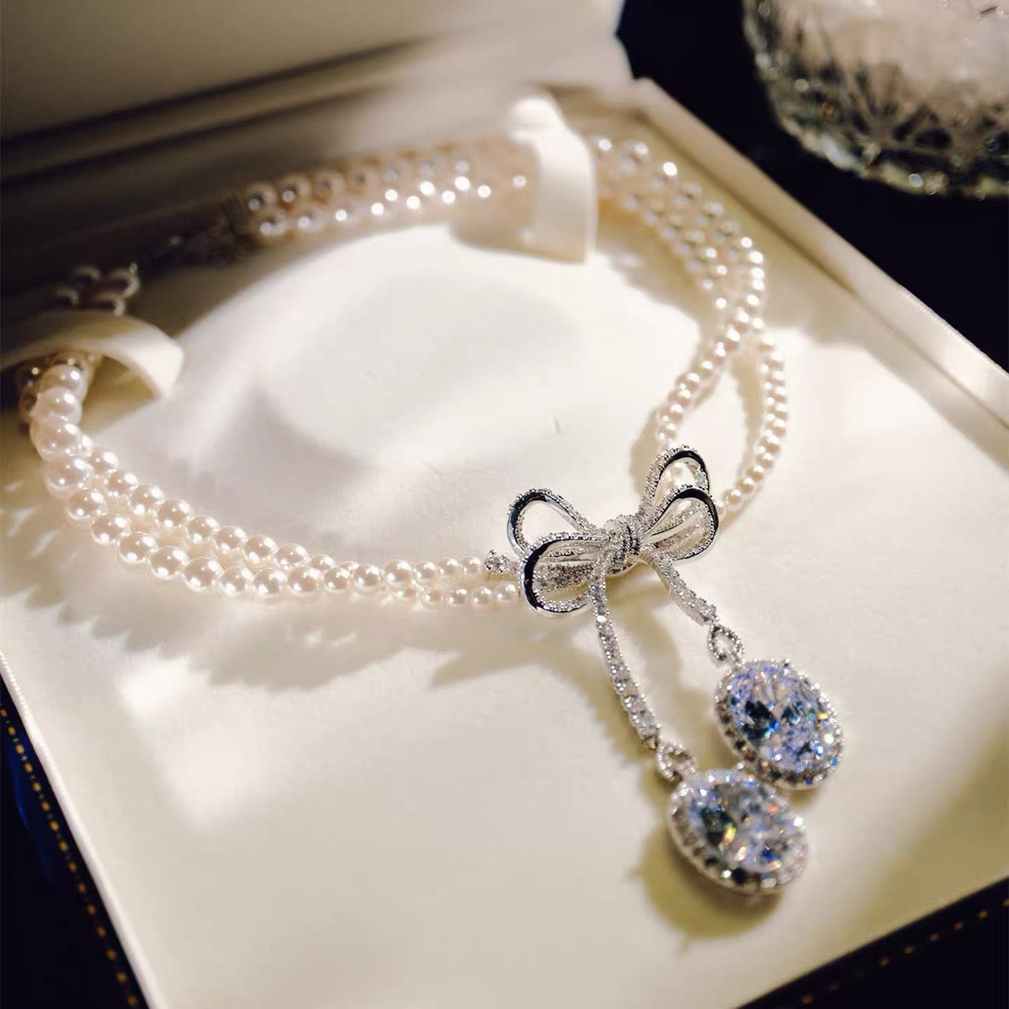 Pearl and White Zircon Bow Jewel Set