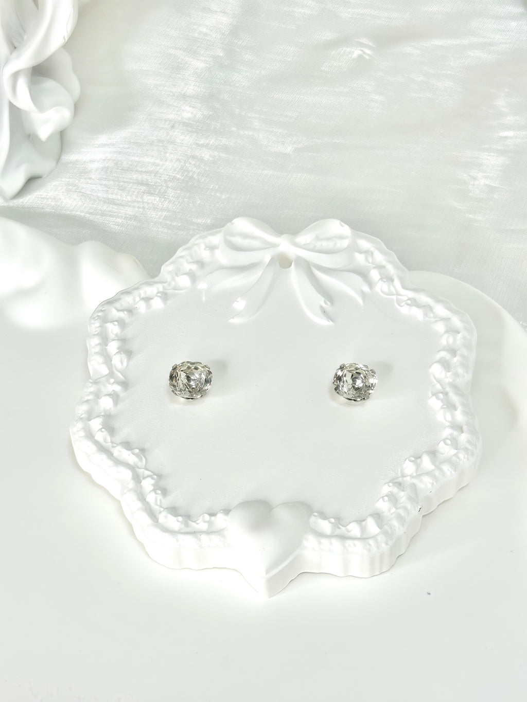Shiny White Titanium Steel Millennium Cut Rose Pattern Earrings