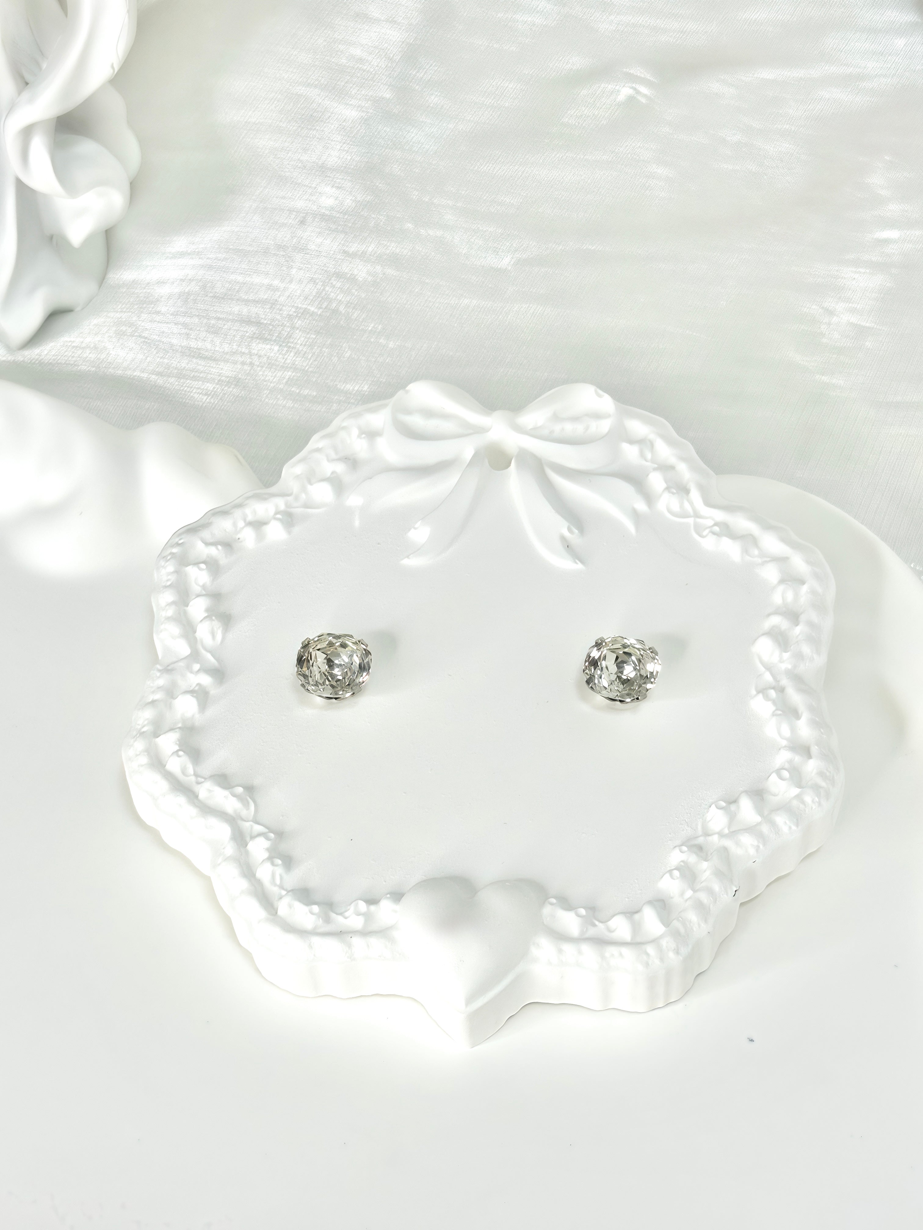 Shiny White Titanium Steel Millennium Cut Rose Pattern Earrings