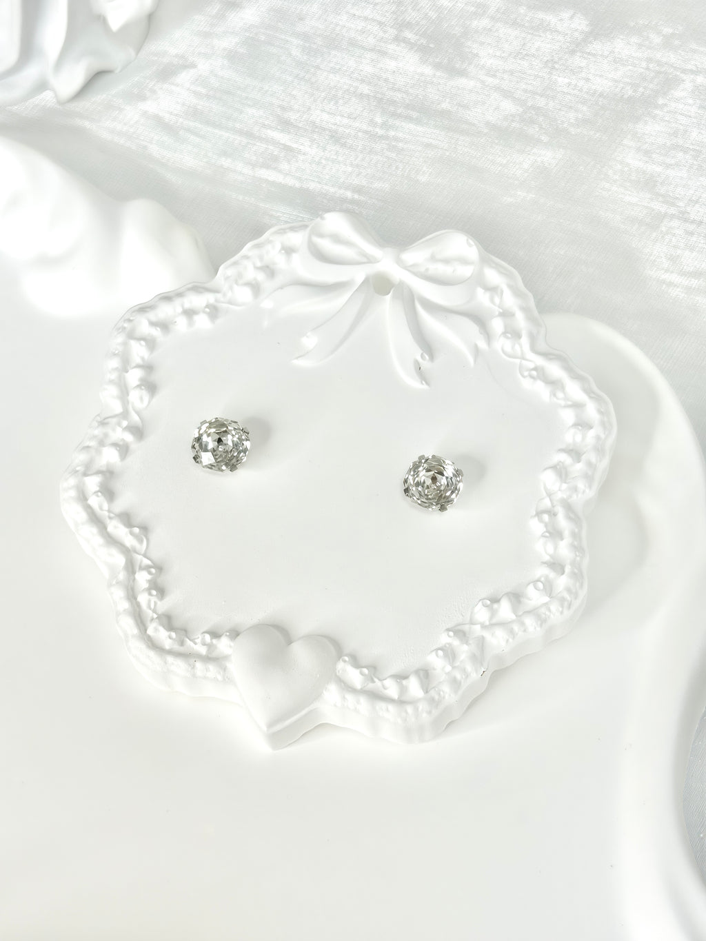 Shiny White Titanium Steel Millennium Cut Rose Pattern Earrings