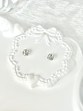 Shiny White Titanium Steel Millennium Cut Rose Pattern Earrings