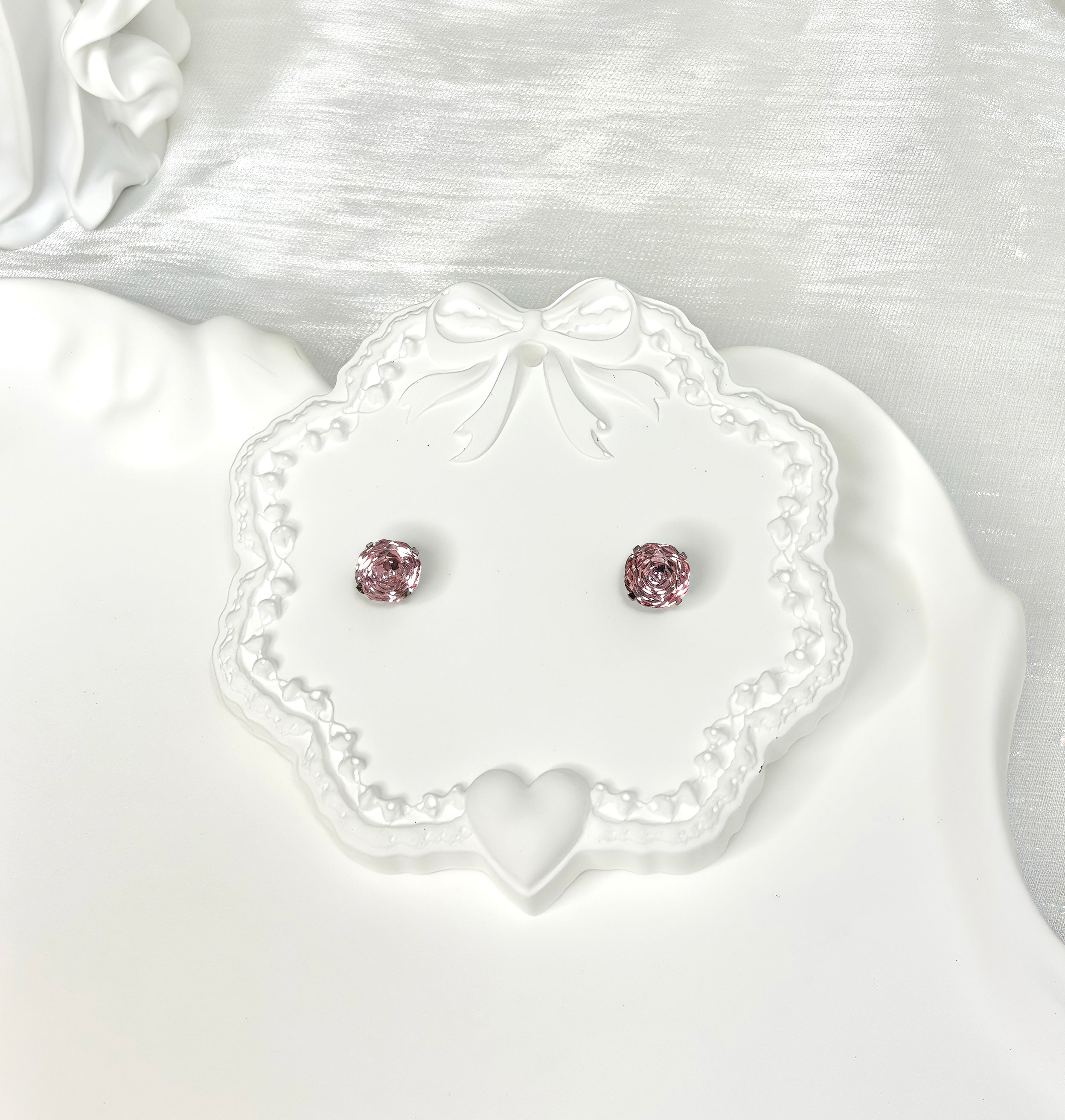 Shiny Pink Titanium Steel Millennium Cut Rose Pattern Earrings